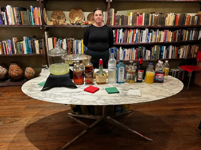 Bartender serving guests from a mobile event bar